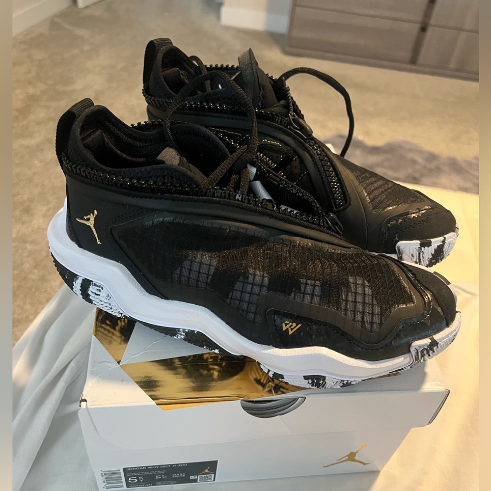 Nike Kids Black and White Basketball Shoes with Gold Logo